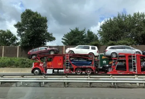 A car carrier trailer for open auto transport